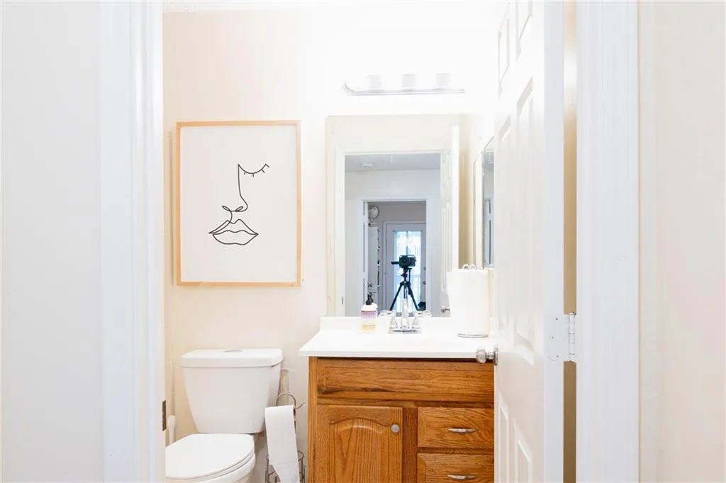 Bathroom featuring toilet and vanity