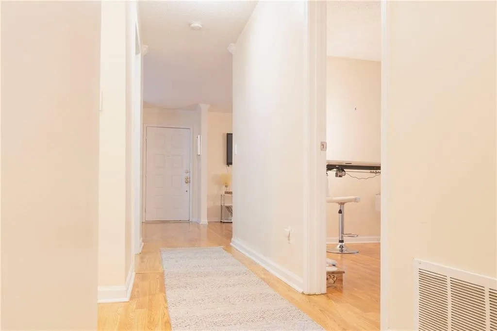 Hallway featuring light hardwood / wood-style flooring