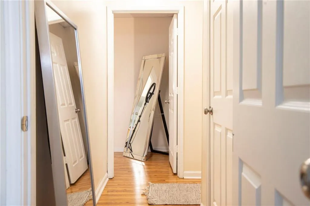 Hallway featuring light wood-type flooring