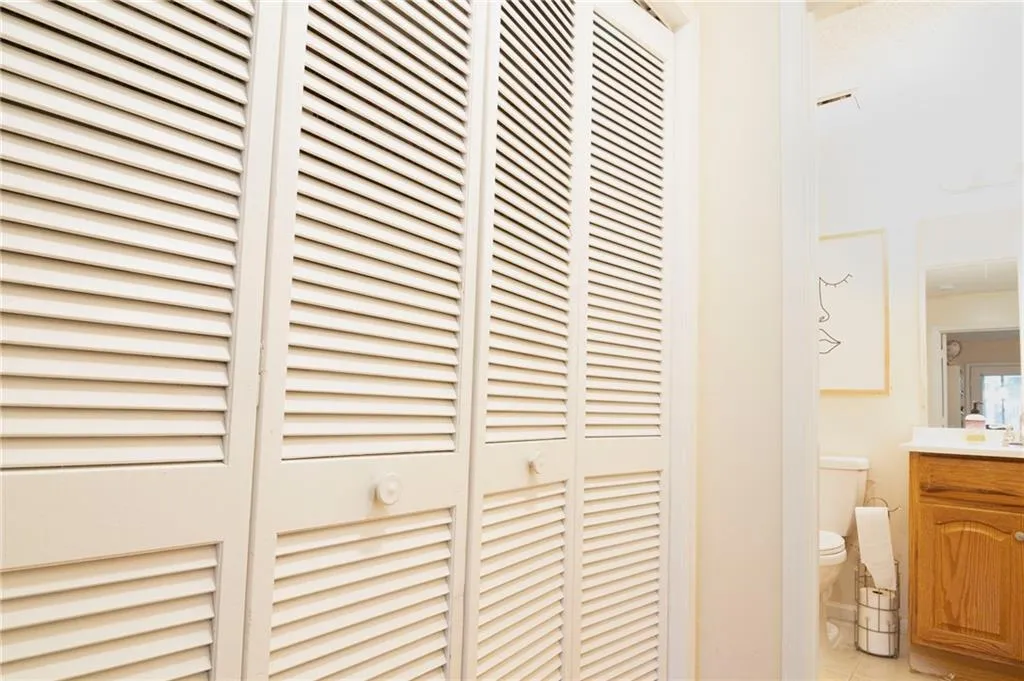 Details featuring vanity and toilet