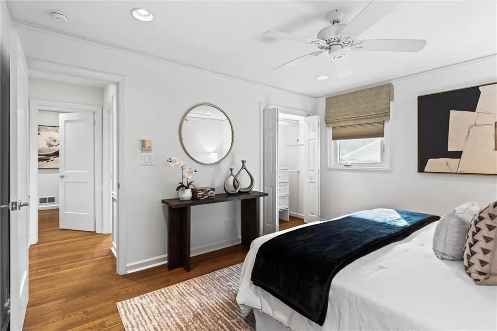 Bedroom featuring dark wood-style flooring, recessed lighting, and a ceiling fan