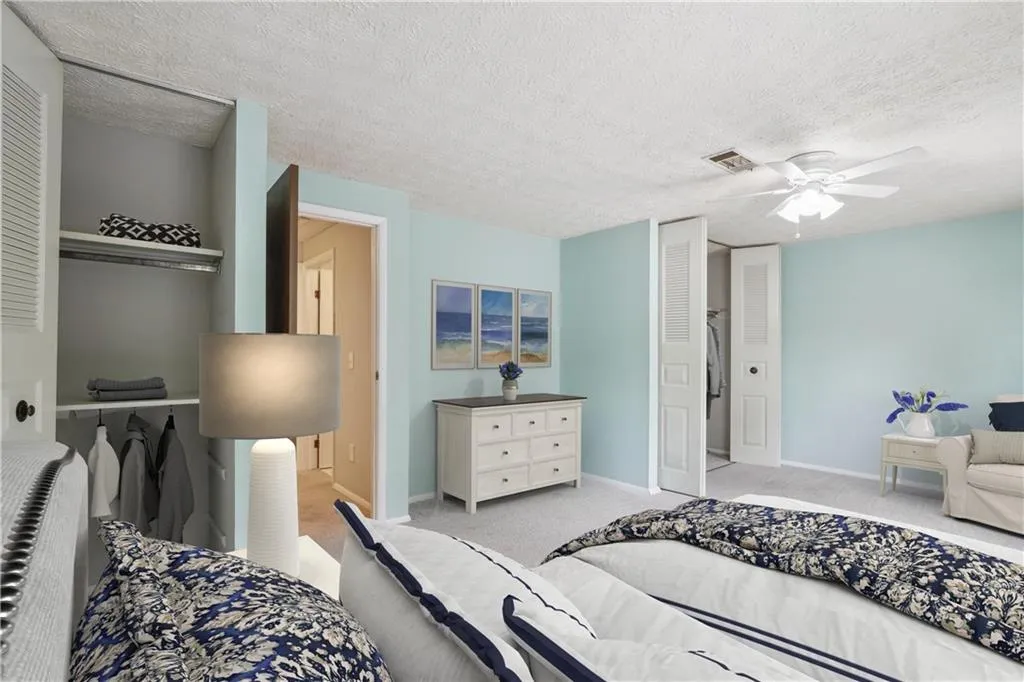 Bedroom in front large enough for a bed and sofa or chair