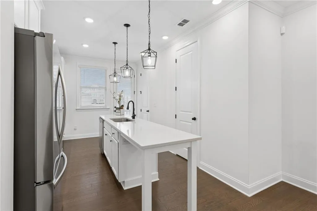 Kitchen featuring a central island and walk in pantry