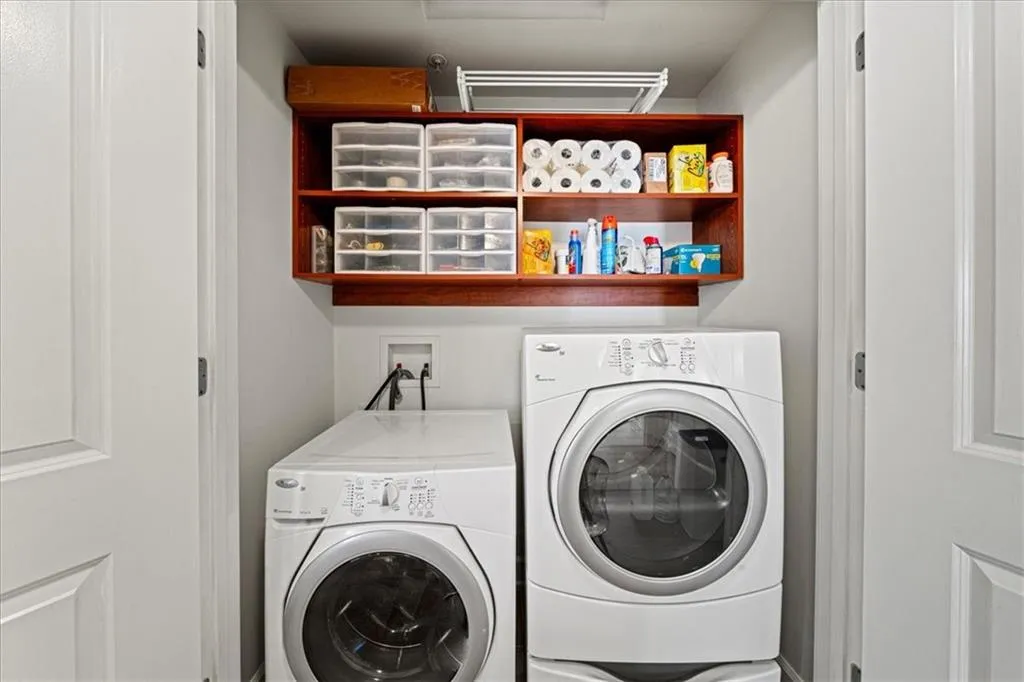 Laundry area featuring separate washer and dryer