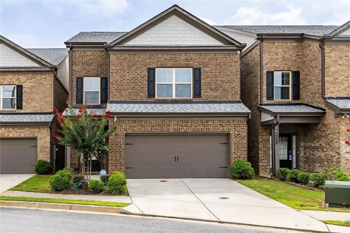 Brick exterior with contrasting dark shutters
