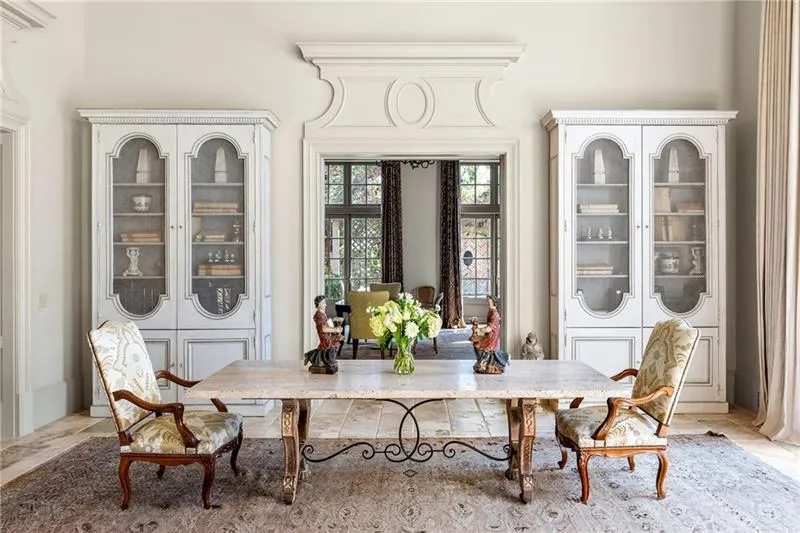 Dining area at the end of the Living Room and looking into the family room
