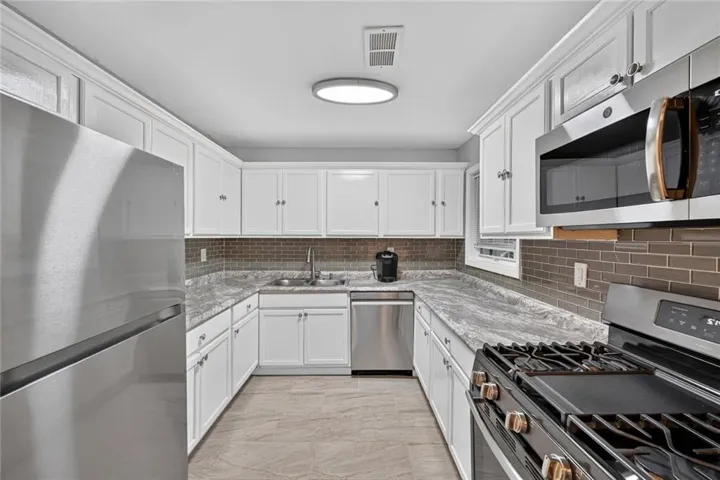 Beautiful kitchen with stainless steel appliances