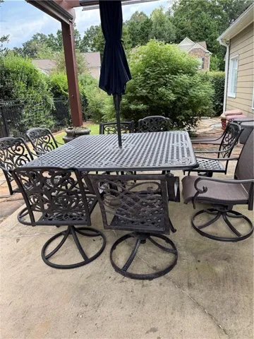 Covered patio featuring a concrete surface and substantial overhead structure