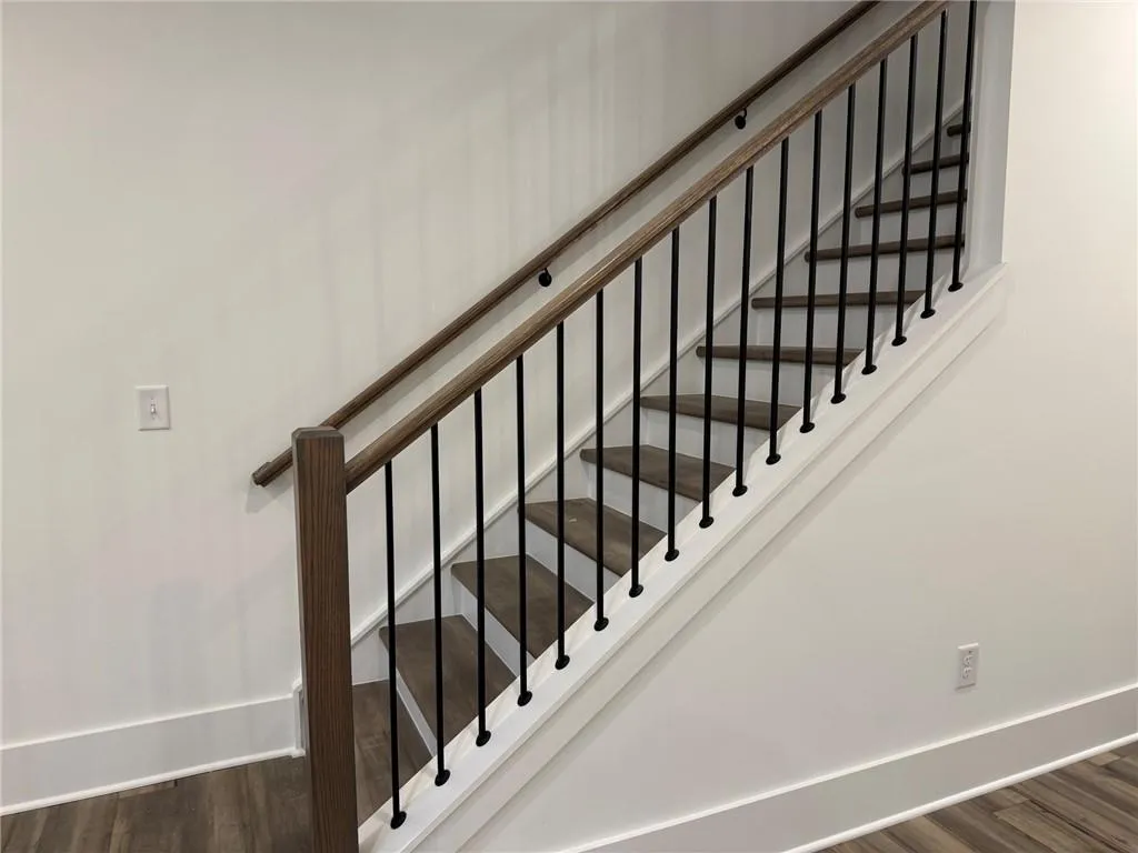 Open railings w/ iron spindles.  Example of design finishes planned for the home.