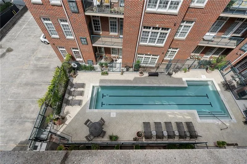 Community pool featuring fence