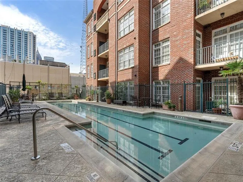 Community pool with fence