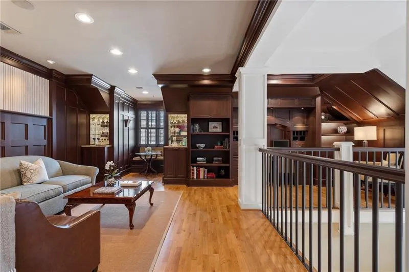 Living room featuring visible vents, crown molding, light wood-style flooring, and recessed lighting