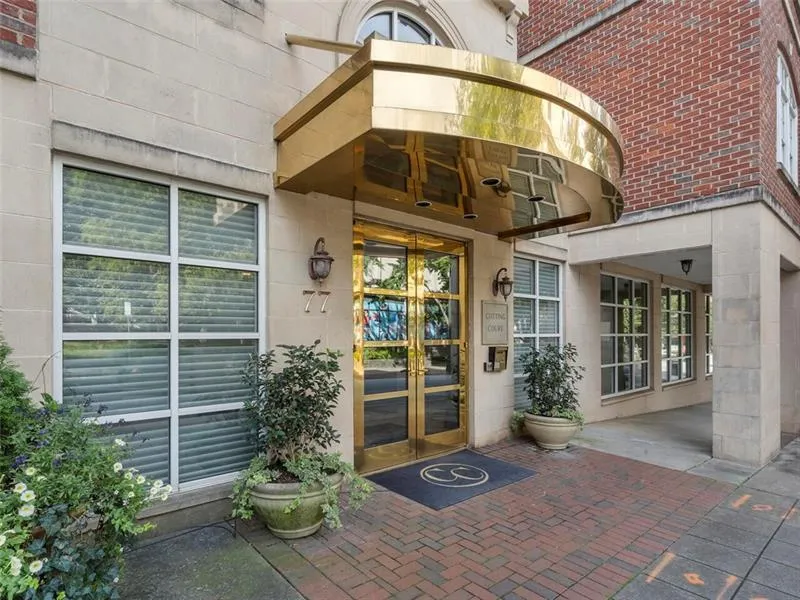 Property entrance featuring french doors