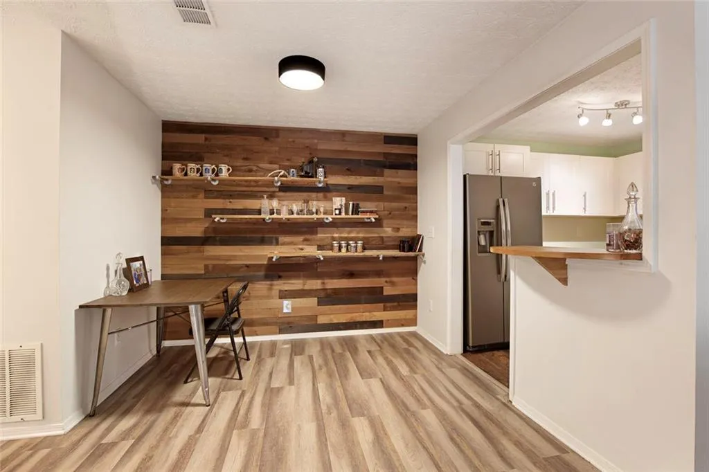 Dining area with shiplap wall