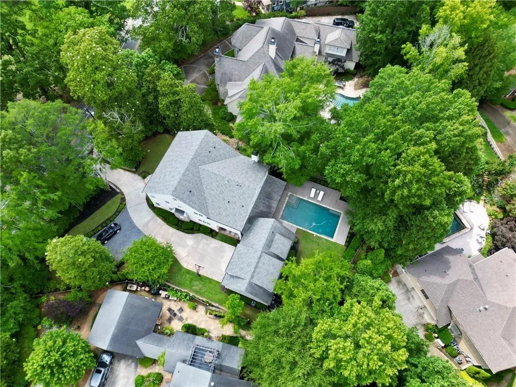 Aerial view of residential area with a pool