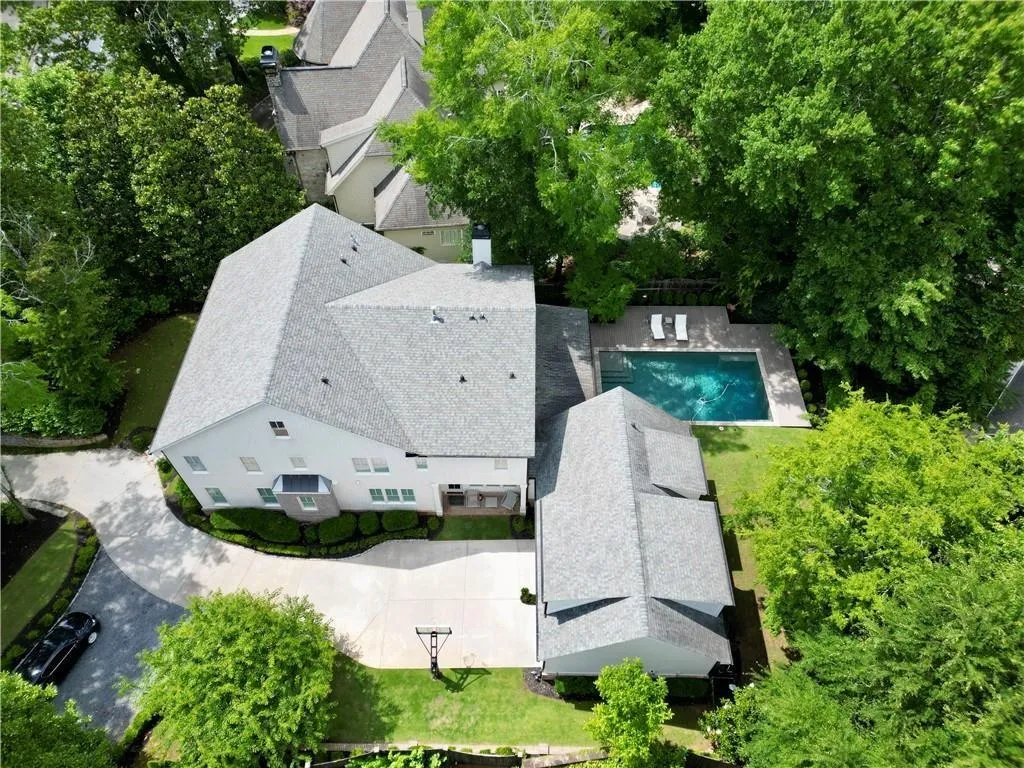 View from above of property featuring a pool area