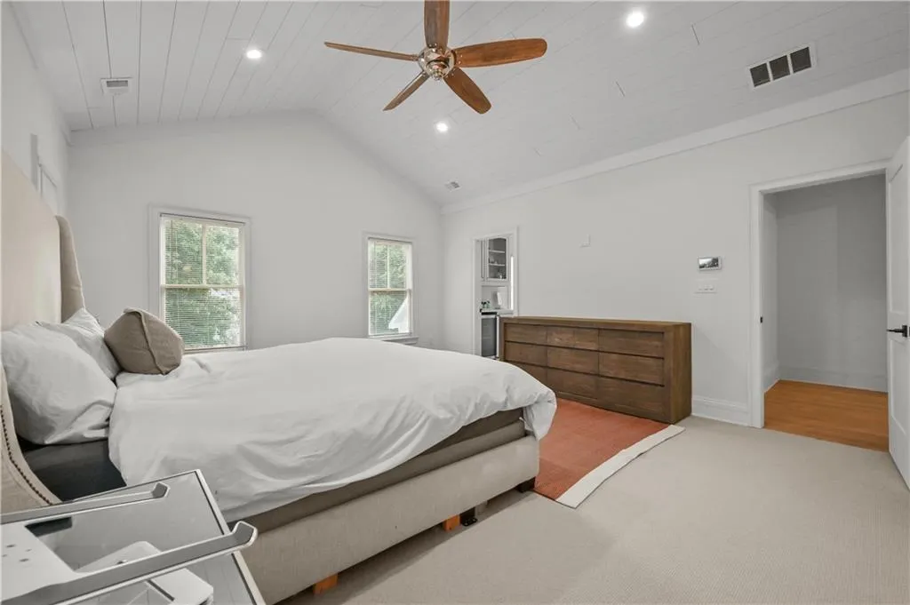 Bedroom with carpet floors, wooden ceiling, lofted ceiling, recessed lighting, and ceiling fan