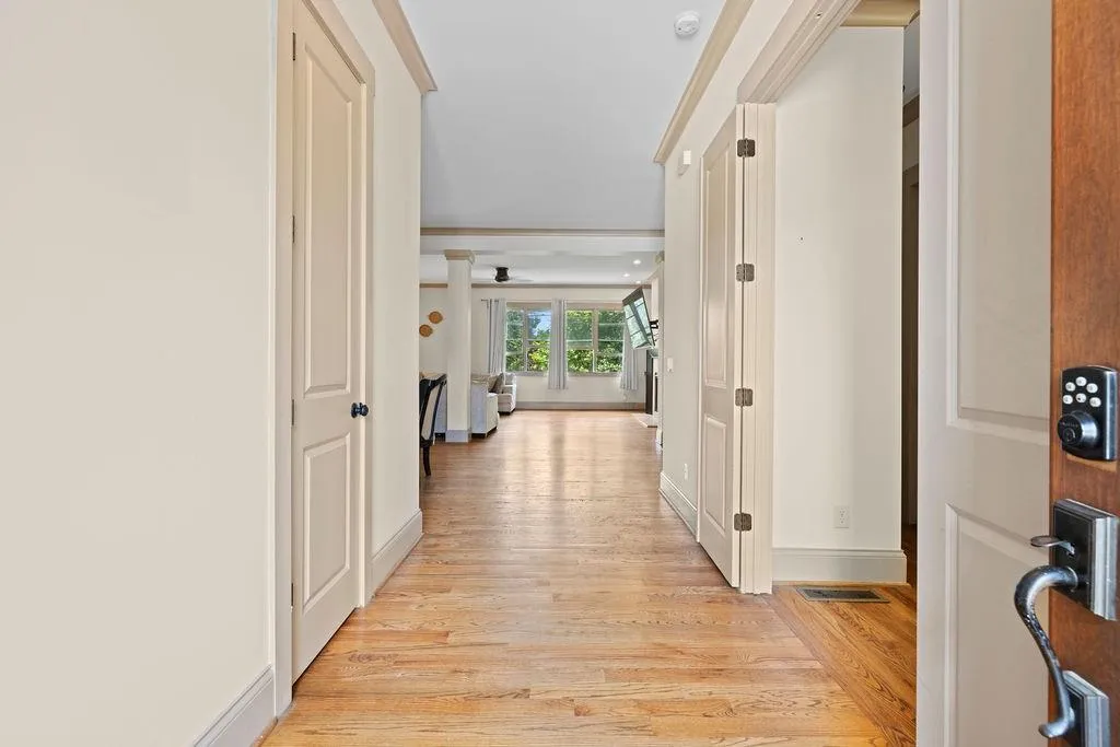 Corridor featuring light hardwood / wood-style flooring