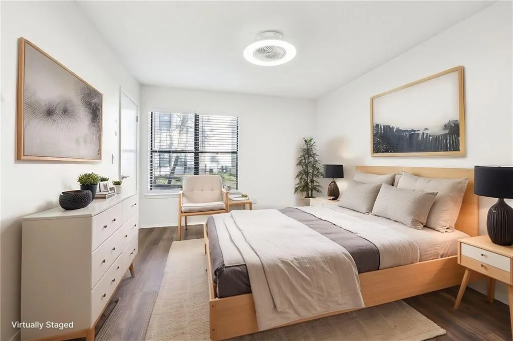 Both bedrooms have access to separate bathrooms that feature newer vanities and desirable subway tile.
