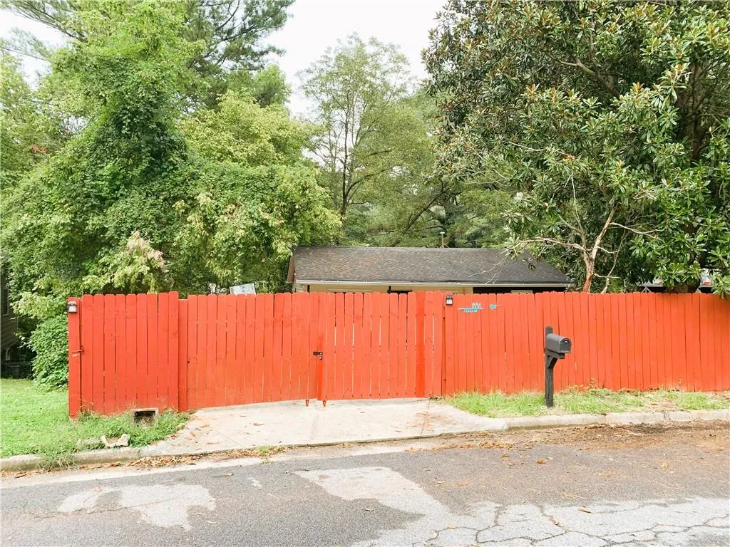 View of yard with a gate