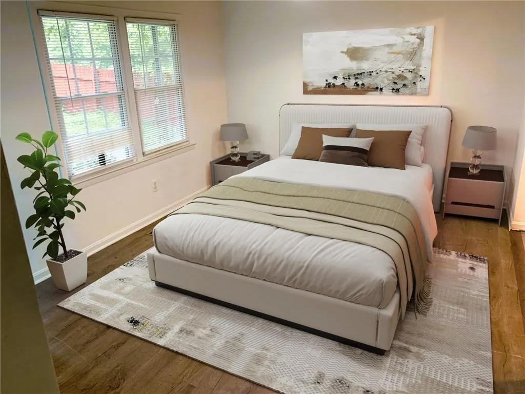 Bedroom with wood finished floors