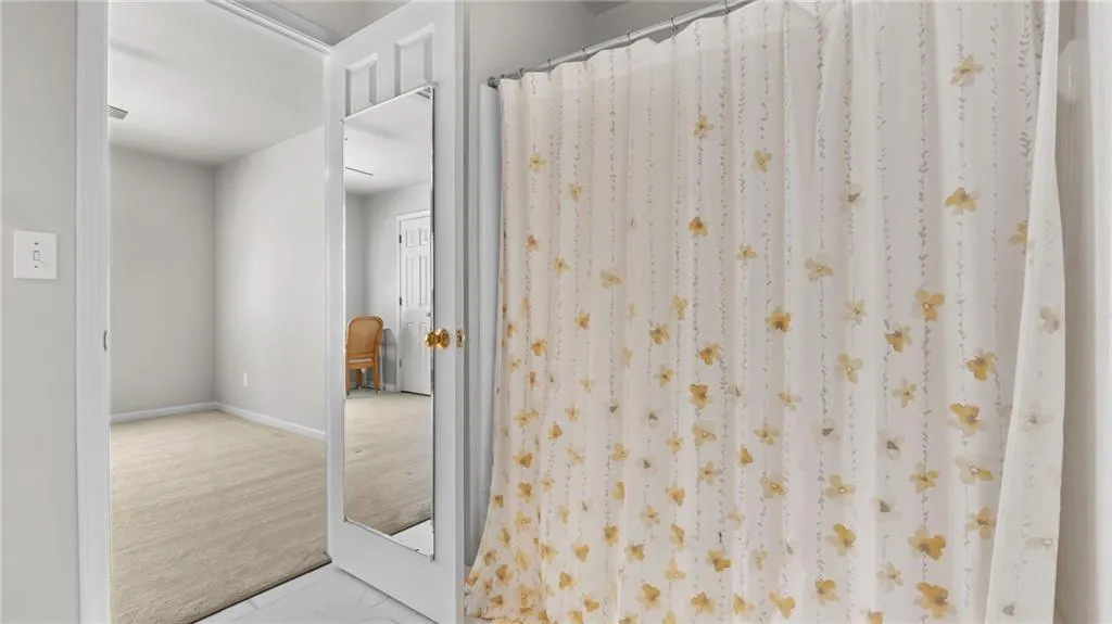 Bathroom featuring baseboards