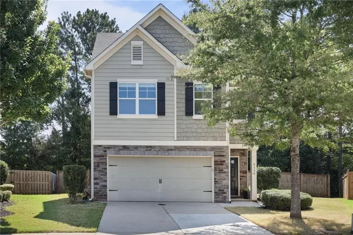 3 story home with large fenced yard