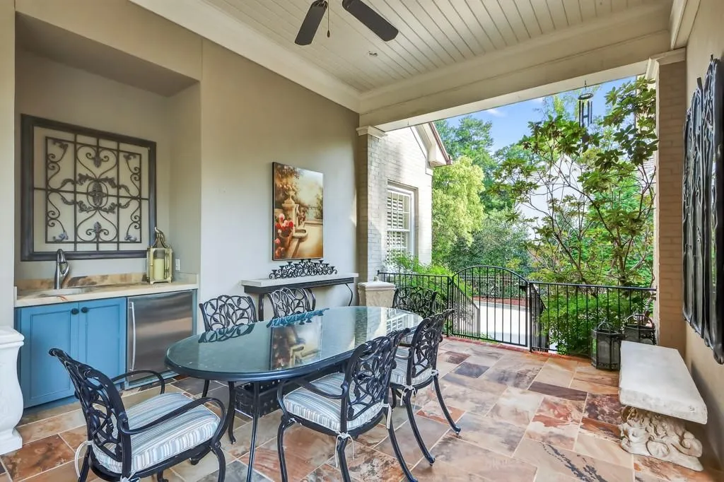 Dining area on veranda with wet bar & refrigerator