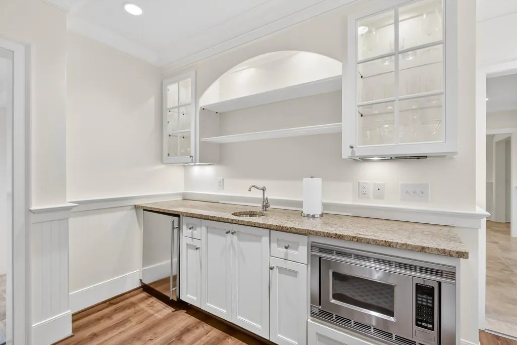 Terrace level kitchenette with refridgerator and microwave