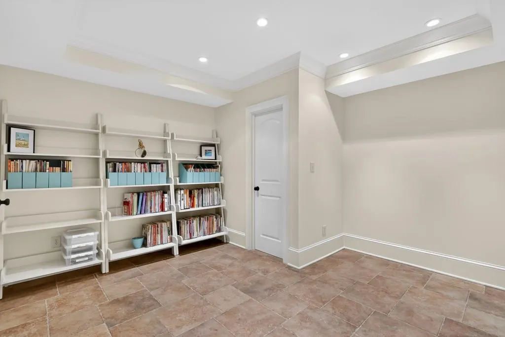 Finished space for a wine room or storage on the terrace level.