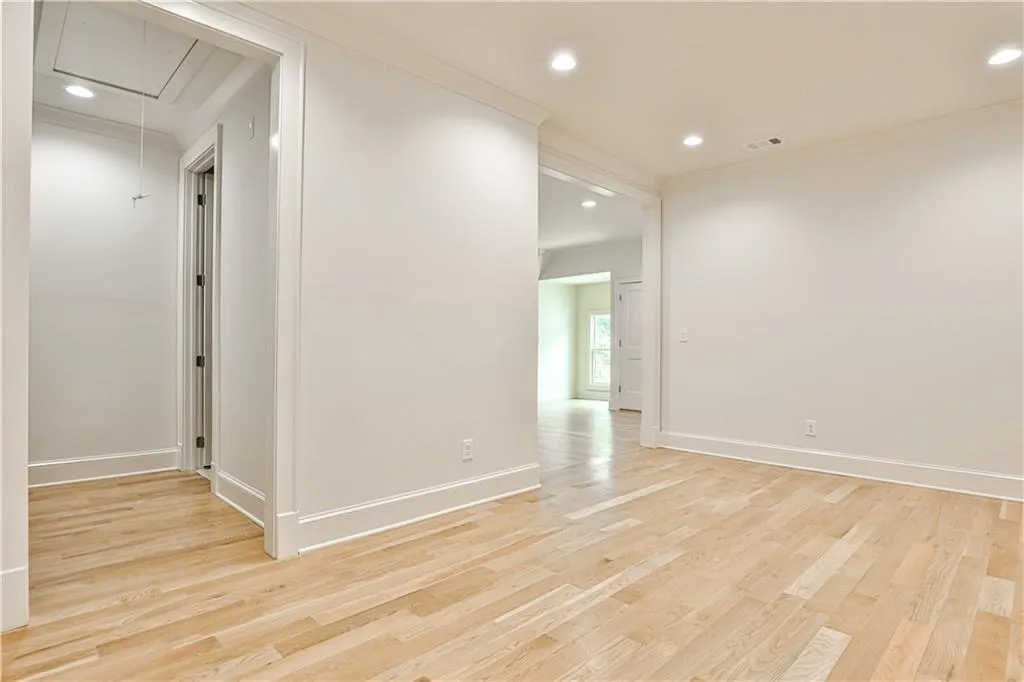 Spare room featuring light wood-type flooring