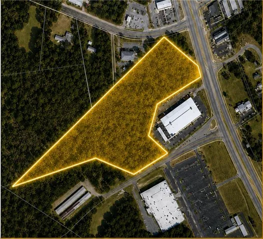 Aerial View, Property Highlighted. Illustrating the boundaries of the property from an overhead perspective