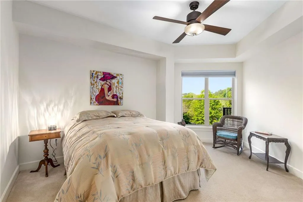 Good sized bedroom with a seating nook.