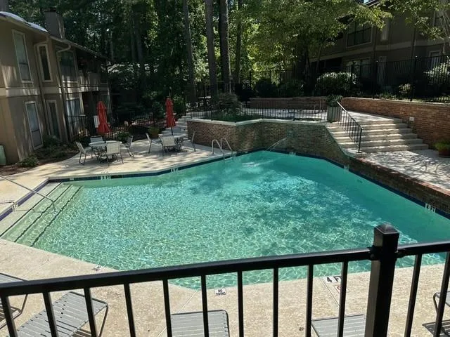 View of swimming pool with a patio area View of swimming pool with a patio area