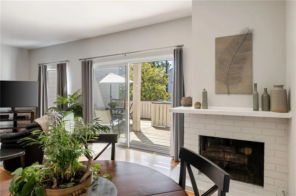 Great room opens to a large elevated main level deck for private indoor/outdoor living and entertaining