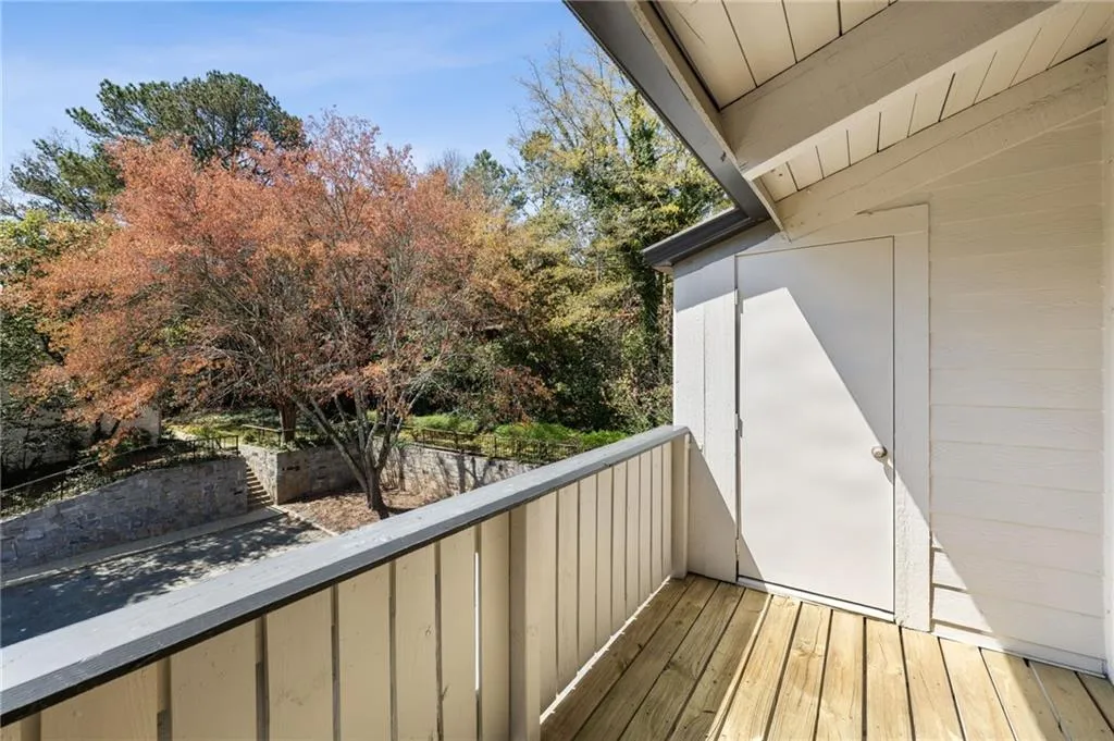 Primary bedroom private deck with storage closet