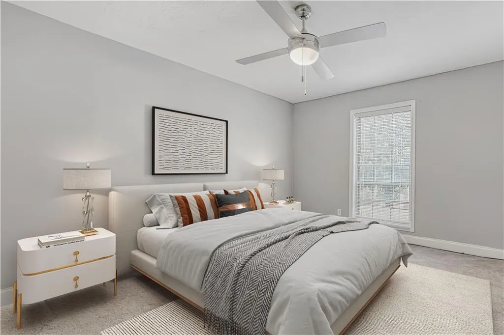 Bedroom featuring carpet and a ceiling fan