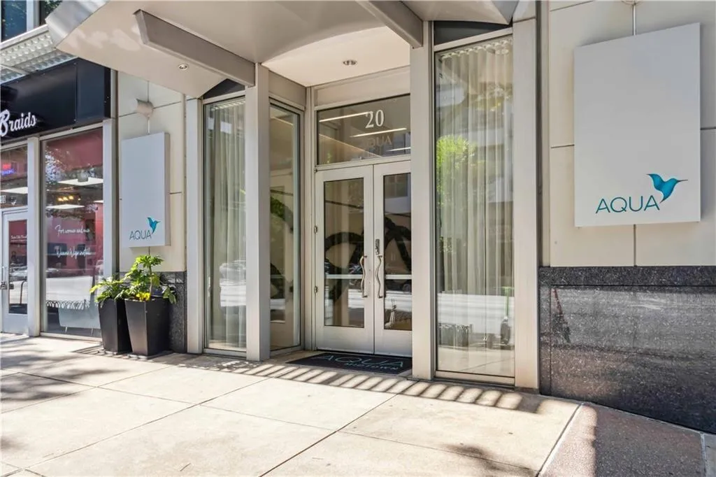 View of exterior entry featuring french doors