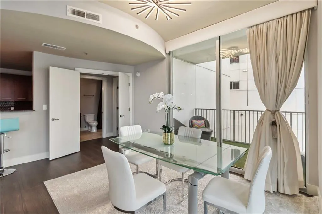 Dining room featuring baseboards and wood finished floors
