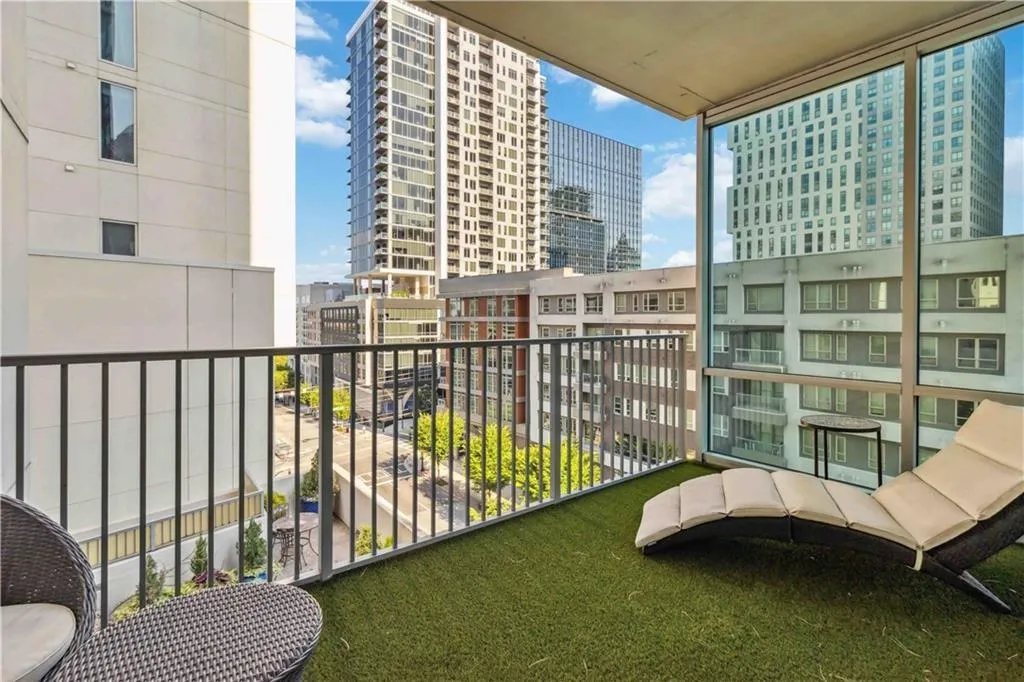 Balcony featuring a view of city