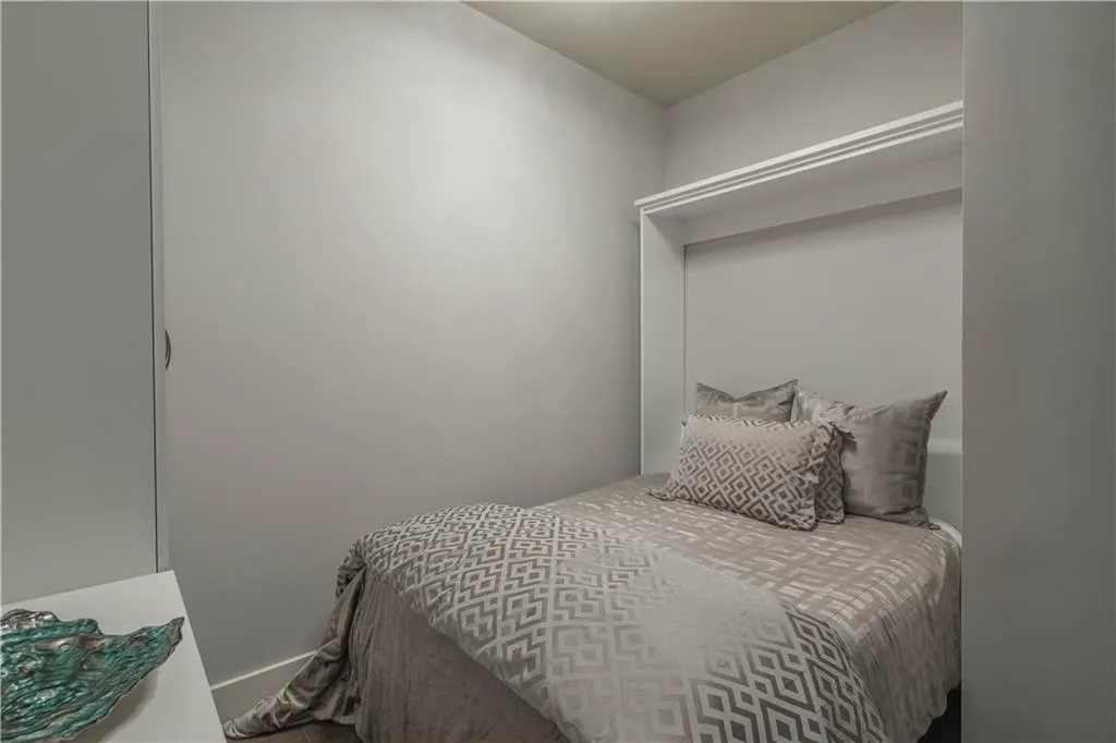 Bedroom featuring baseboards