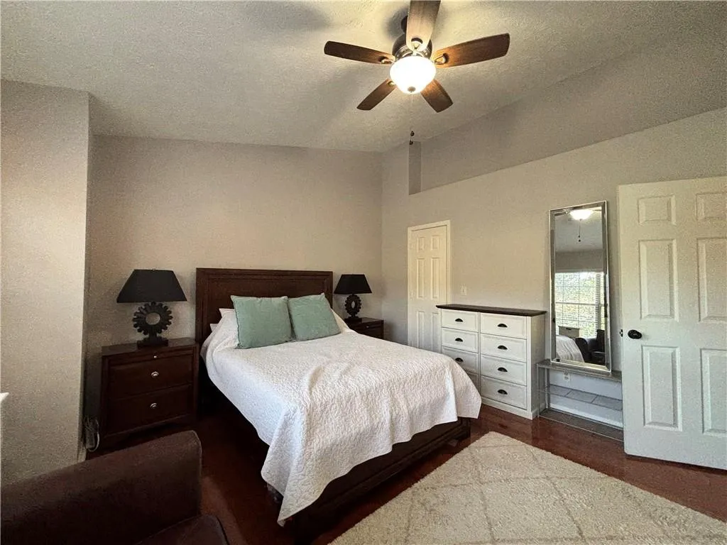 Main bedroom and entry into private bathroom