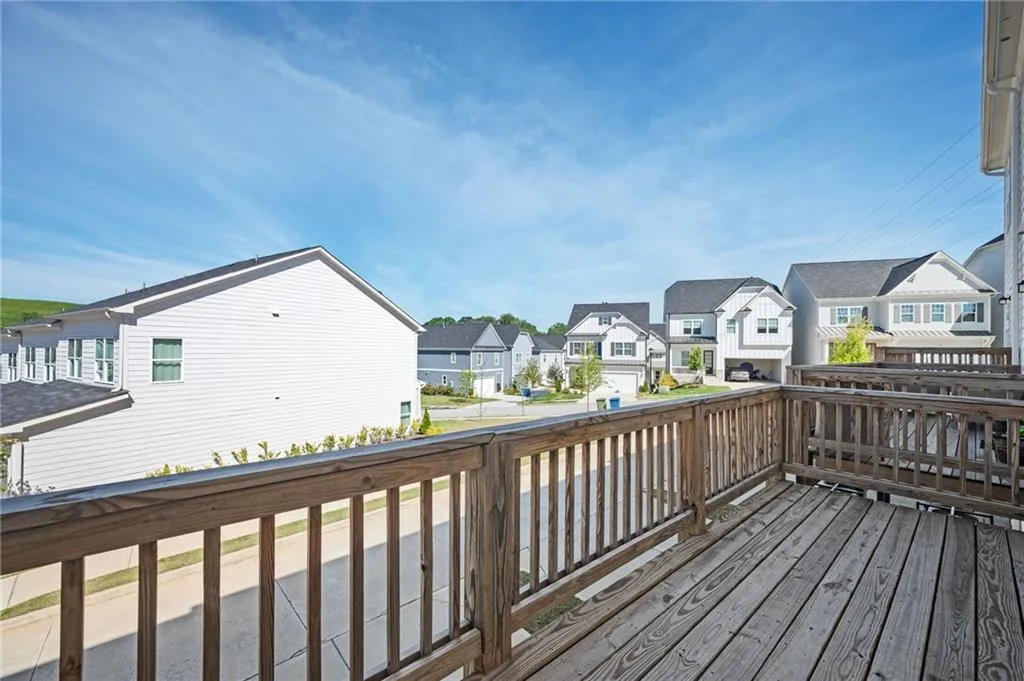 Wooden deck featuring a residential view