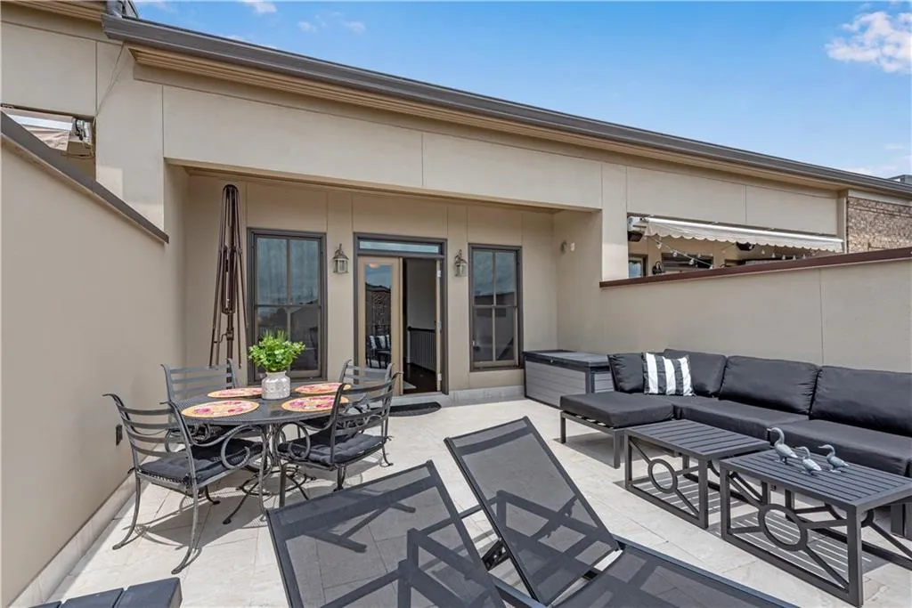 View of patio with an outdoor living space