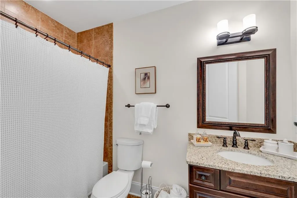 Bathroom with vanity and toilet