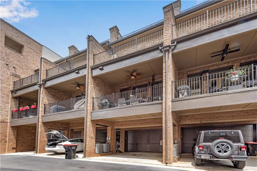View of property featuring a garage