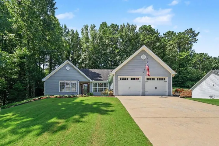 WELL MAINTAINED HOME ON A CORNER LOT! FENCED BACKYARD! SUNROOM! SPLIT BEDROOM PLAN!