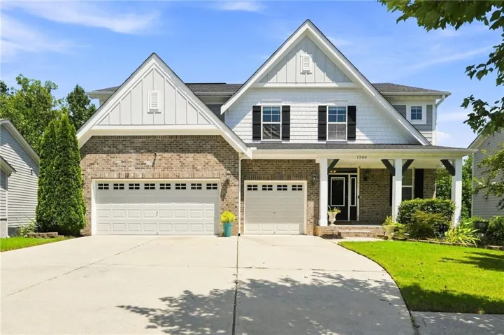Brick and siding exterior with gabled roof lines