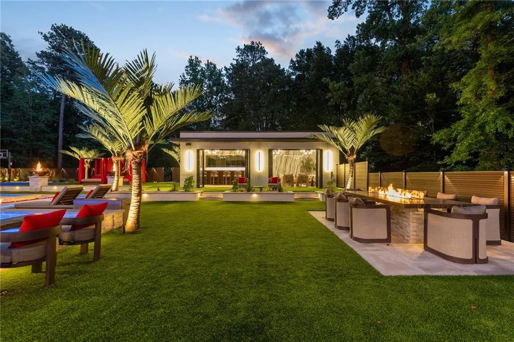 Outdoor dining table with fire feature and seating for 10