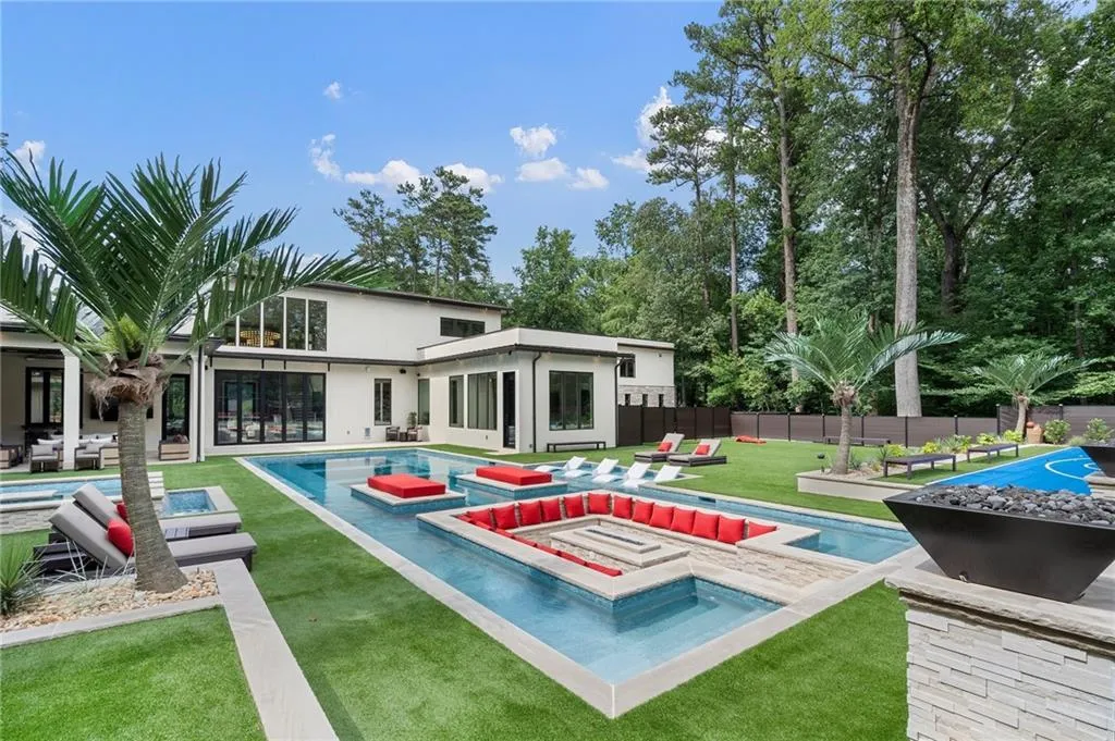 Sunken fire pit inside pool with seating for 20